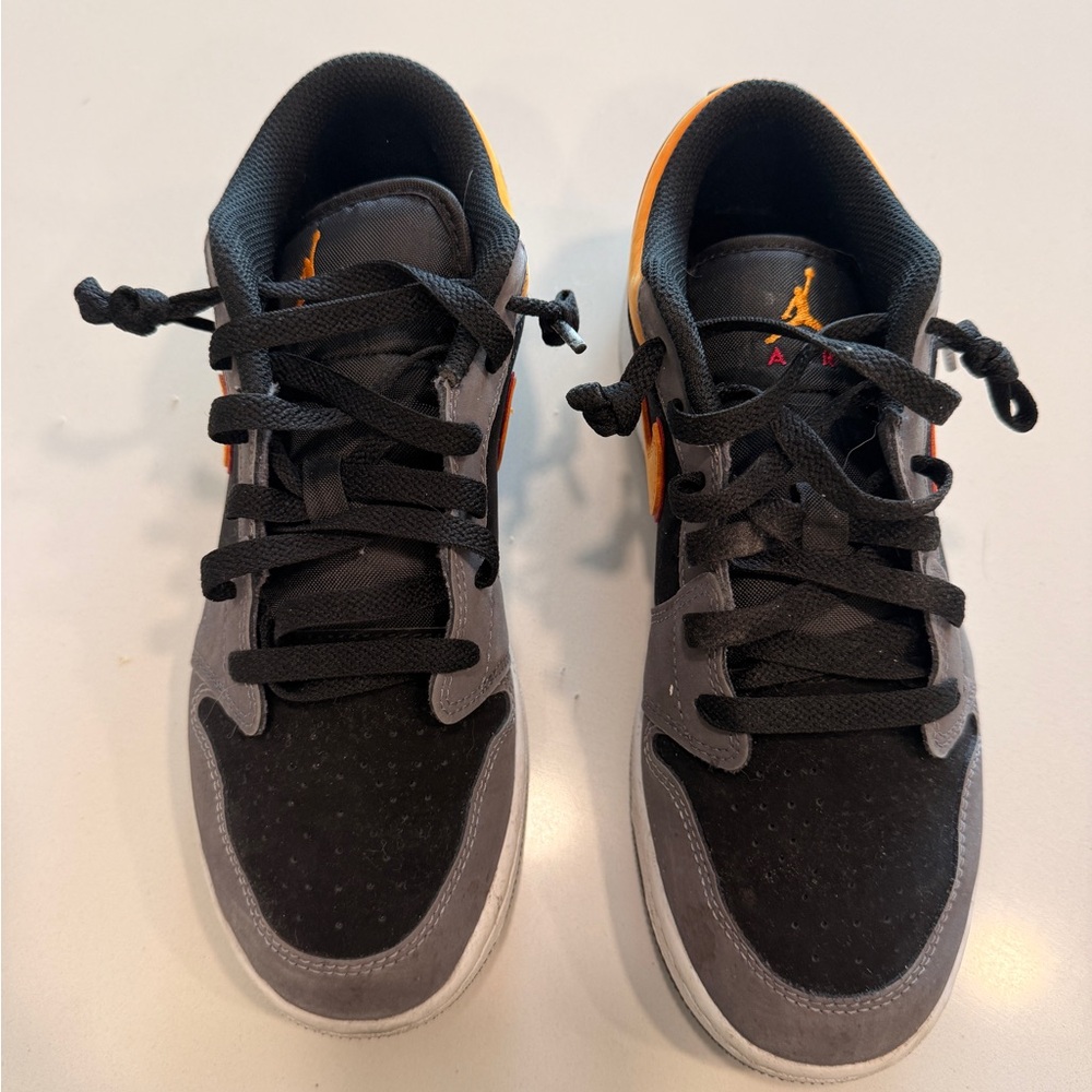 Blacj and Orange Nike Jordan’s